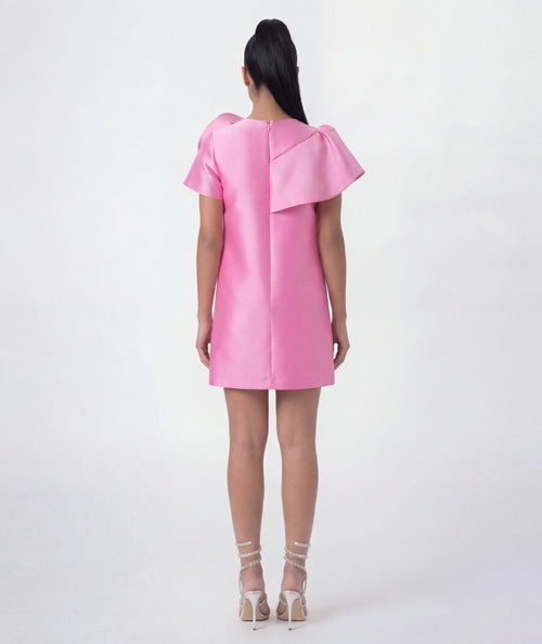 Pink dress with ruffled sleeves on a white background