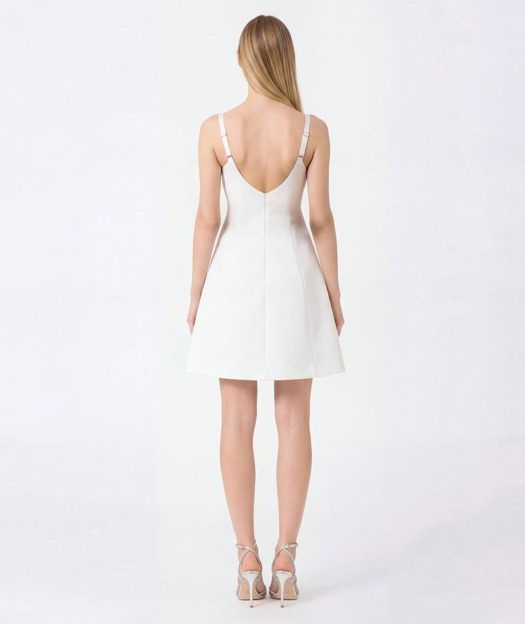 blonde women wearing white dress back shot