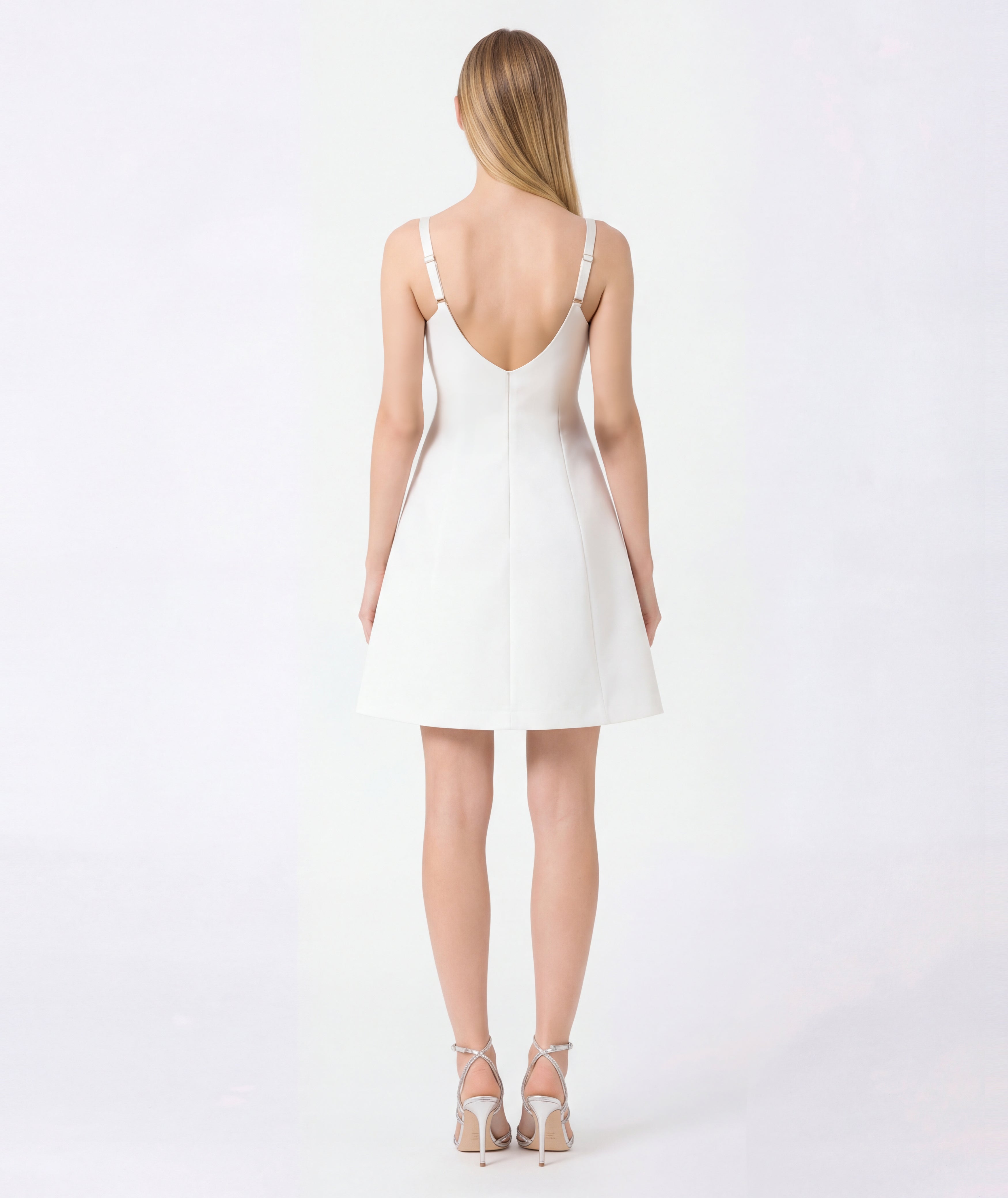 blonde women wearing white dress back shot