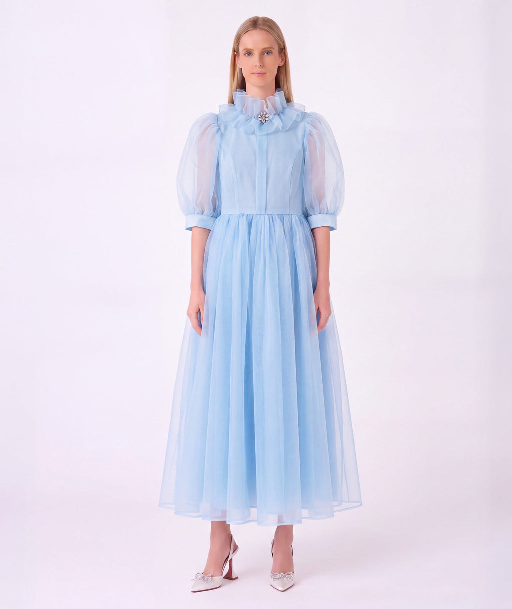 Organza Ruffles Women's Dress in powder blue with jeweled brooch, ruffled high neck and puff sleeves by Mama Luma