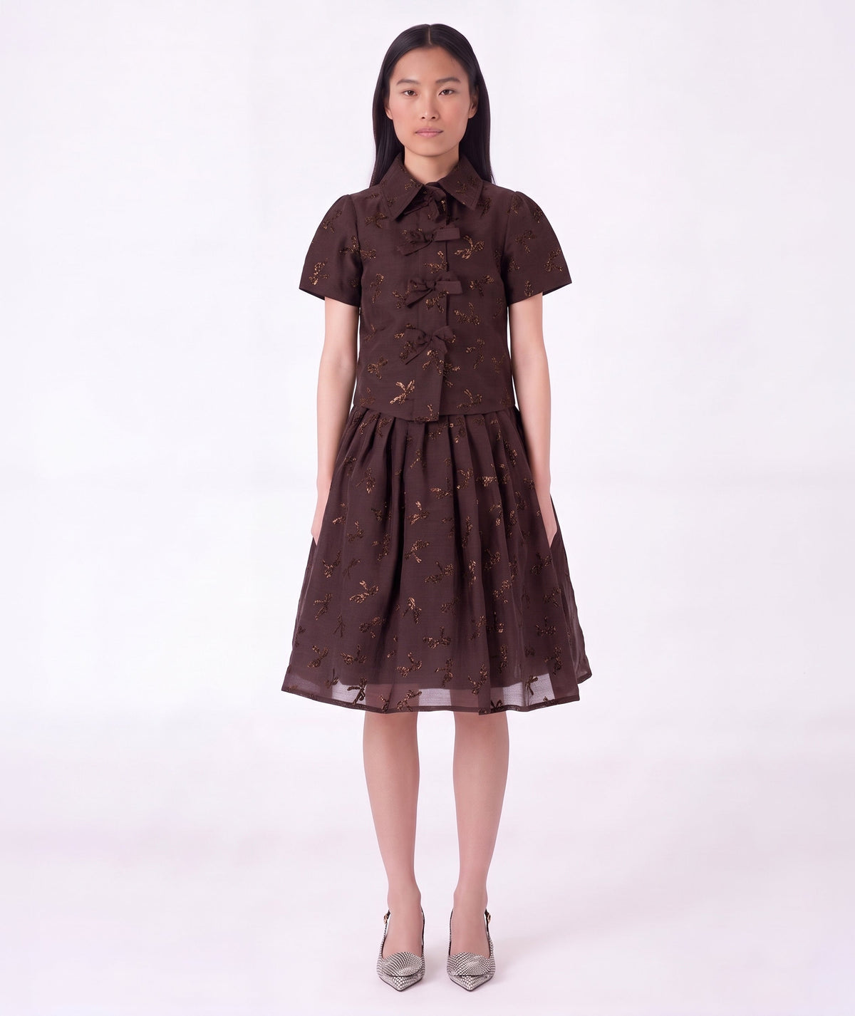 Front view of Shimmering Mocha Women's Outfit featuring a structured bow-detailed top and matching gathered midi skirt by Mama Luma.